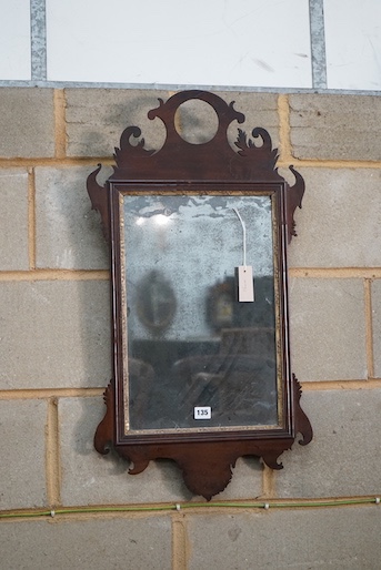 An 18th century mahogany fret cut wall mirror, width 44cm, height 80cm